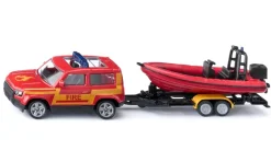 Land Rover Defender avec bateau