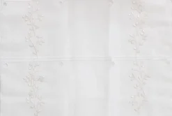 Module brodé blanc/beige 58cm - Vendu au mètre