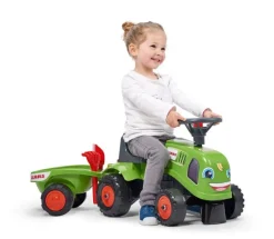 Porteur tracteur Claas avec remorque pelle et râteau FALK