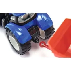 Tracteur New Holland avec fourche à palette
